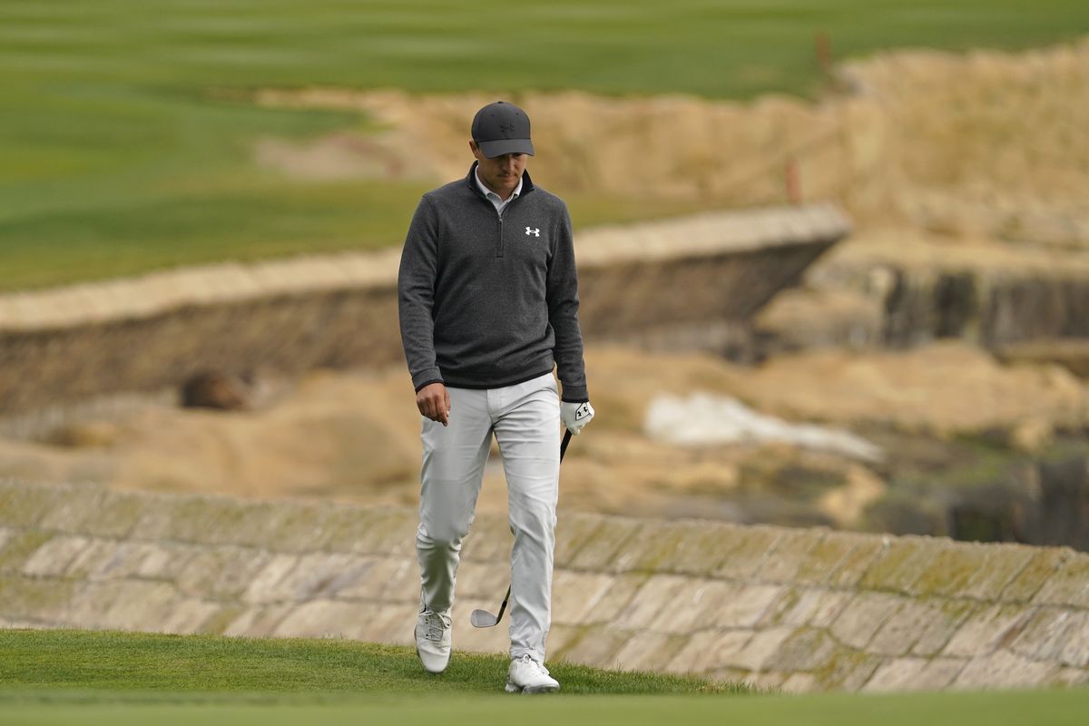 Jordan Spieth walks up to the 18th green of the Pebble Beach Golf Links during the final round of the AT&T Pebble Beach Pro-Am golf tournament Sunday, Feb. 14, 2021, in Pebble Beach, Calif.  (Associated Press)