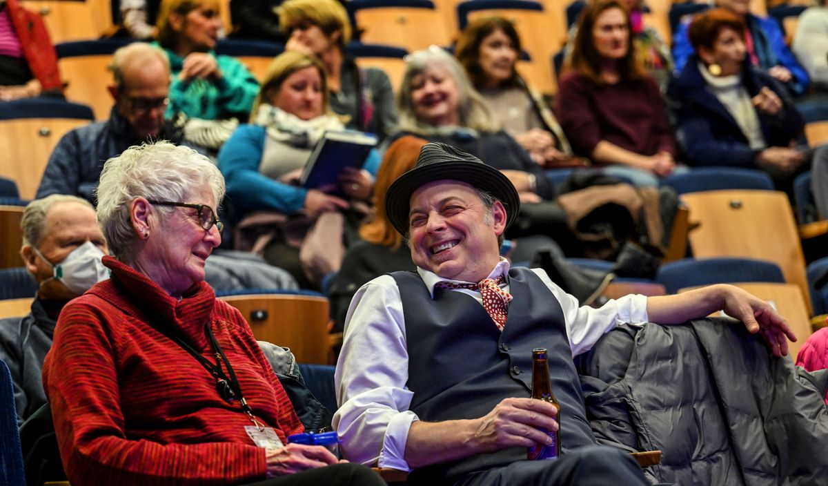 Author Jonathan Evison shares a laugh with Karen Ellis during a Northwest Passages event held, Tue, Nov 14, 2023, in the Myrtle Woldson Performing Arts Center on the Gonzaga University campus.  (Kathy Plonka)