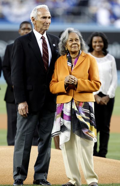 Former Dodger pitching great Sandy Koufax, left, stands with Rachel Robinson. (Associated Press)