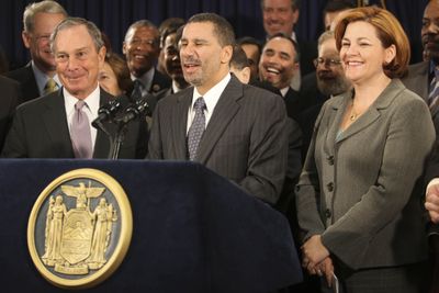 New York Gov. David Paterson, center, is joined by New York City Mayor Michael Bloomberg and City Council Speaker Christine Quinn at a news conference Thursday.  (Associated Press / The Spokesman-Review)