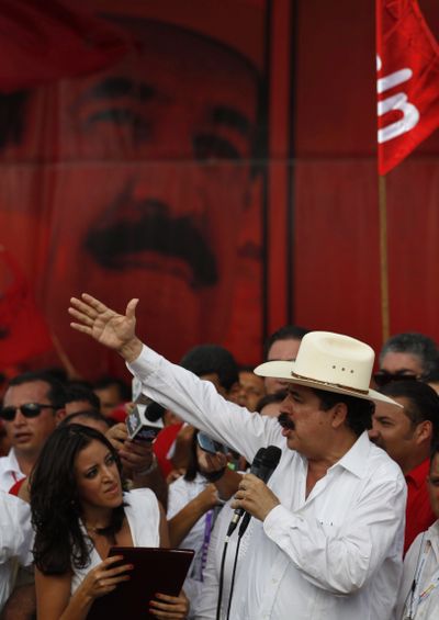 Ousted former Honduras President Manuel Zelaya delivers a speech during a welcoming rally in Tegucigalpa, Honduras, on Saturday. (Associated Press)