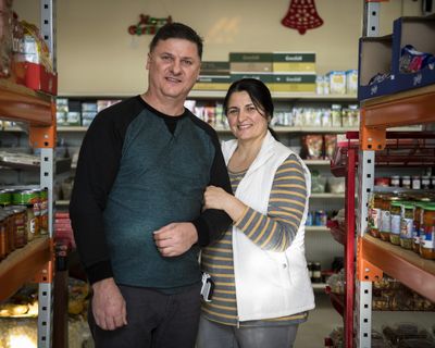 Nickolay and Tatyana Chubenko came to the U.S. from what is now the Ukraine 20 years ago, fleeing religious persecution. They're now naturalized citizens who have raised three children in Spokane and run a small Russian bakery and European grocery store. (Colin Mulvany / The Spokesman-Review)