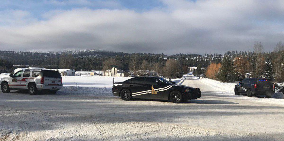 Officers with the Idaho State Police block Mountain View Road in Blanchard after two Bonner County sheriff’s deputies were shot  Monday, January 16, 2017. (Joe McHale / KHQ)
