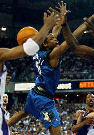 
Minnesota' Latrell Sprewell, center, is stripped of the ball during Monday's game. Minnesota' Latrell Sprewell, center, is stripped of the ball during Monday's game. 
 (Associated PressAssociated Press / The Spokesman-Review)