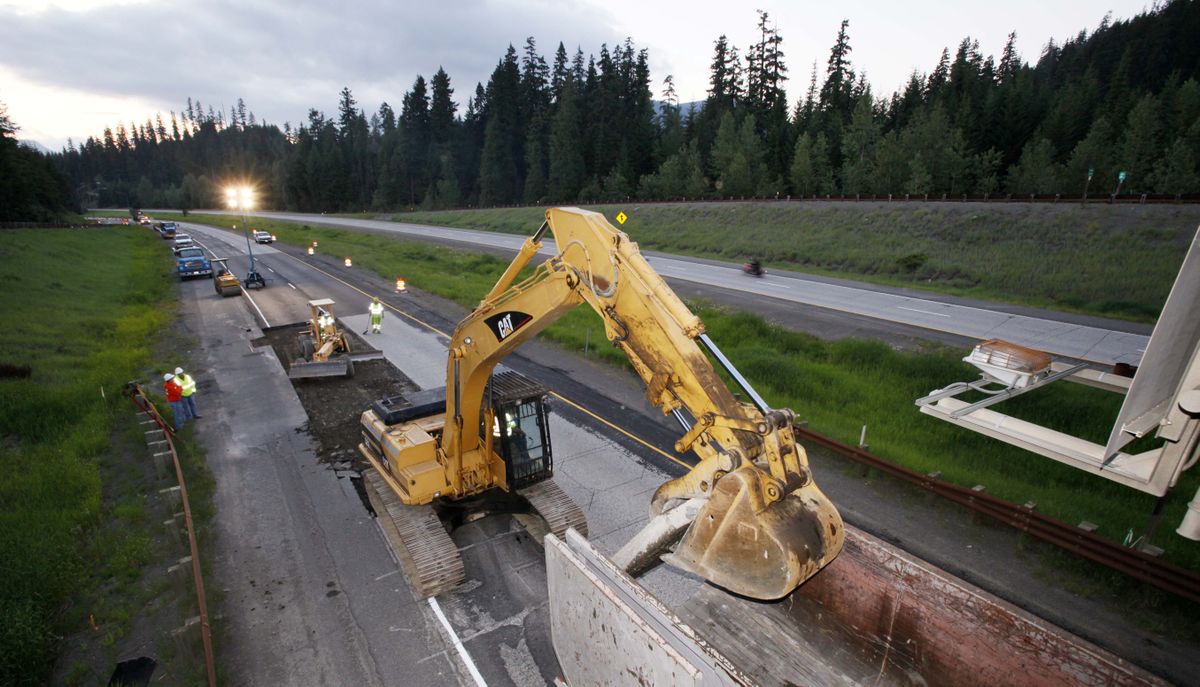 Segments of worn concrete are removed from a section of Interstate 90 last month during a repaving project near Snoqualmie Pass, Wash. Freezing weather and chained-up vehicles have taken their toll on the pass.Associated Press photos (Associated Press photos / The Spokesman-Review)