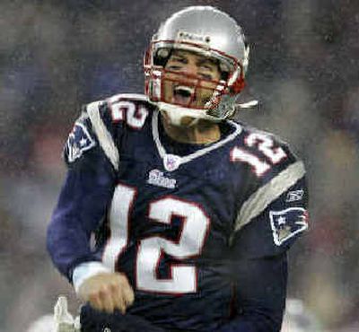 
Tom Brady is undefeated in the playoffs.
 (Associated Press / The Spokesman-Review)