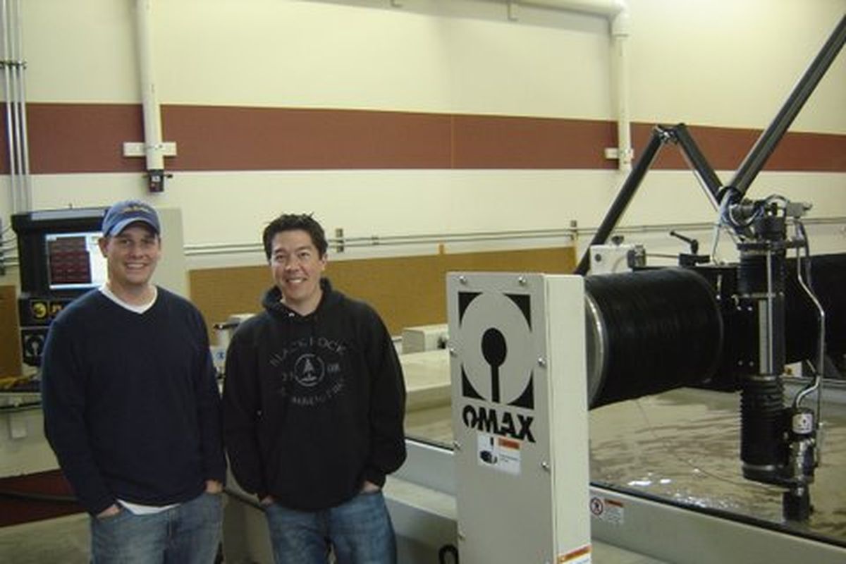 Greg Rowley, left, former golf pro at Black Rock and author of "Golf Naked," is now national sales director for RHI, which fabricates course accessories. It