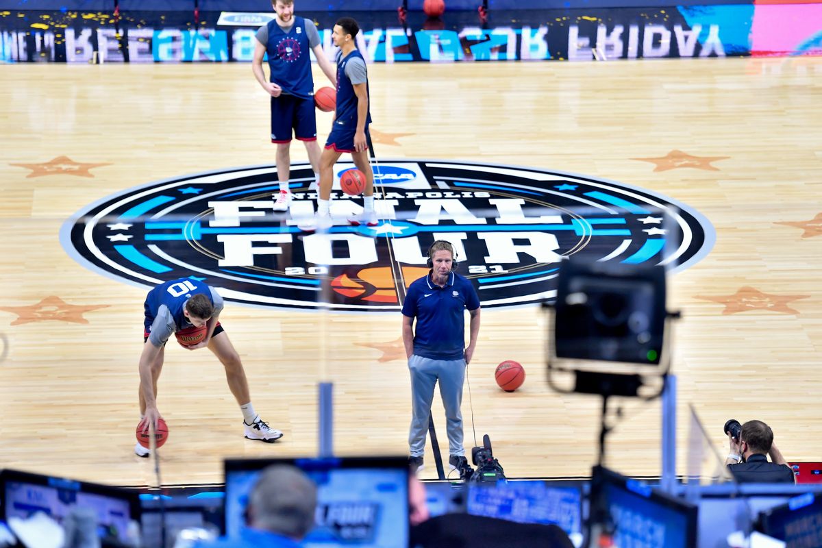 Gonzaga Bulldogs head coach Mark Few speaks with Jim Nantz from the court during a socially distant interview on Friday, April 2, 2021, before Gonzaga faces UCLA in a Final Four matchup Saturday, at Lucas Oil Stadium in Indianapolis, Ind.  (TYLER TJOMSLAND/THE SPOKESMAN-REVIEW)