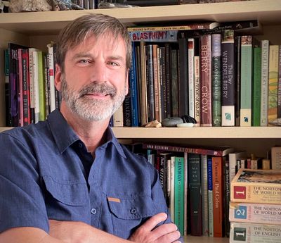 Poet Derek Sheffield stands in his office at Wenatchee Valley College.  (Courtesy of Petra Hernandez)