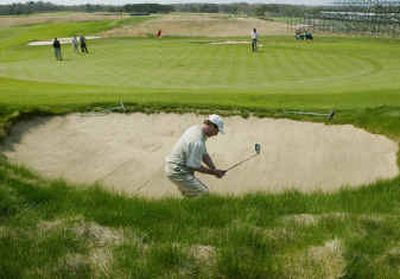 
The 18th green at Shinnecock Hills Golf Club is said to be one of the best finishing holes in the game.
 (Associated Press / The Spokesman-Review)