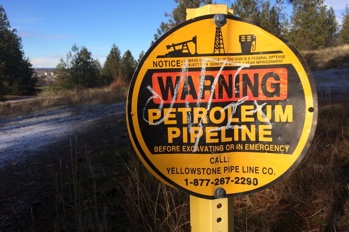 A sign for the Yellowstone Pipe Line at Minnehaha Park is shown on Dec. 30, 2018. A Spokane City Council committee is considering a new 25-year agreement with the Yellowstone Pipe Line Co. to continue operations in Spokane. (Jonathan Brunt / The Spokesman-Review)