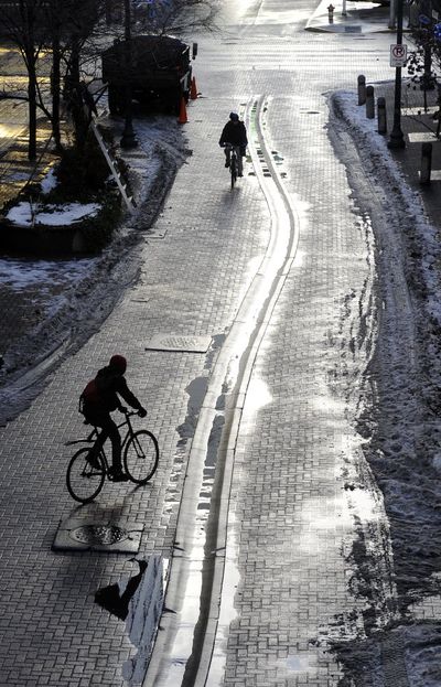 Cyclists on Wall Street in downtown Spokane in 2010. (Jesse Tinsley)