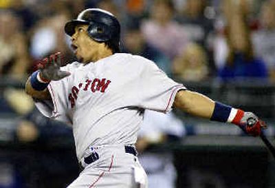 
Boston's Manny Ramirez connects in the first for his ninth career homer off Jamie Moyer. 
 (Associated Press / The Spokesman-Review)