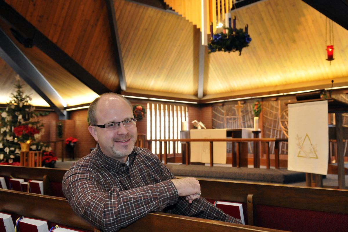 Senior Pastor Matt Larson sits in the sanctuary at Advent Lutheran Church Thursday. Good Shepherd and Christ Lutheran churches joined to form Advent. (Jesse Tinsley)
