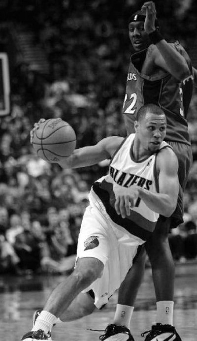 
Portland Trail Blazers guard Brandon Roy, front, leads all rookies in scoring. 
 (Associated Press / The Spokesman-Review)