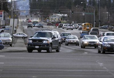 
Cars head north Thursday on University where the Sprague couplet ends in Spokane Valley. 
 (Liz Kishimoto / The Spokesman-Review)