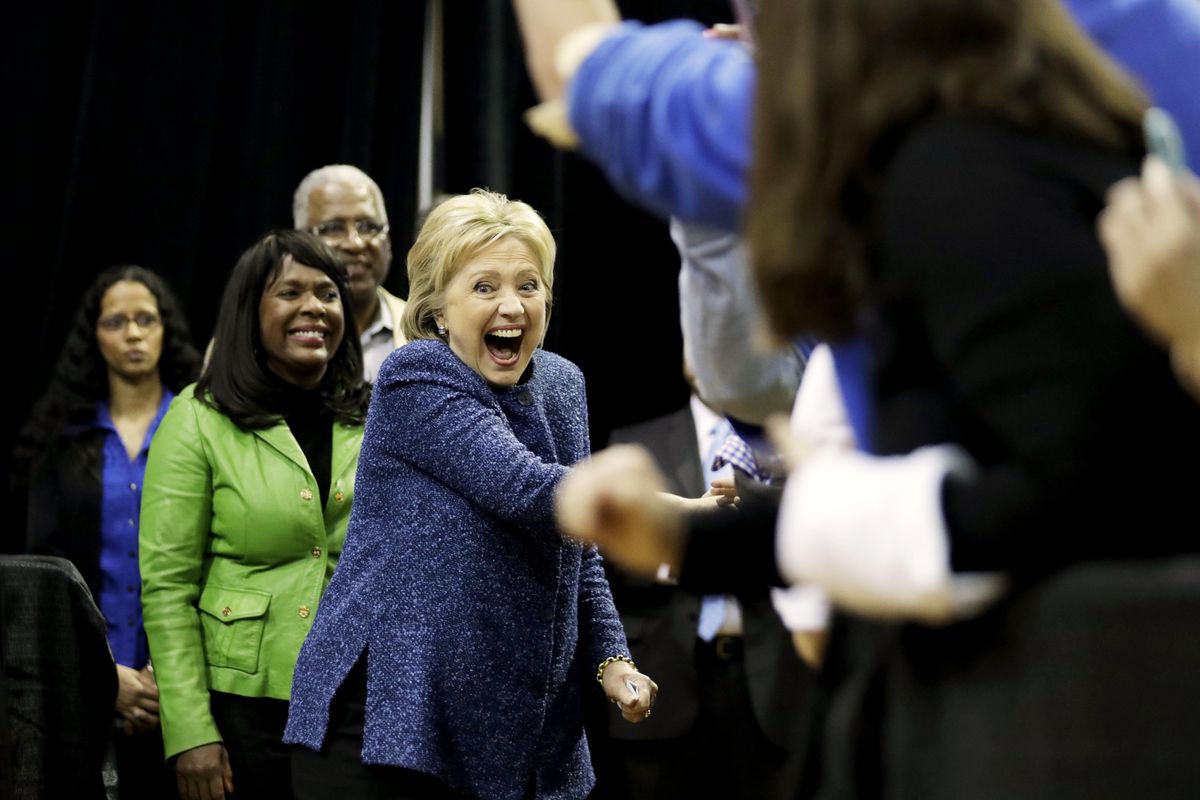Democratic presidential candidate, Hillary Clinton greets the crowd as she arrives for a campaign event at Miles College Saturday, Feb. 27, 2016, in Fairfield, Ala. (David Goldman / Associated Press)