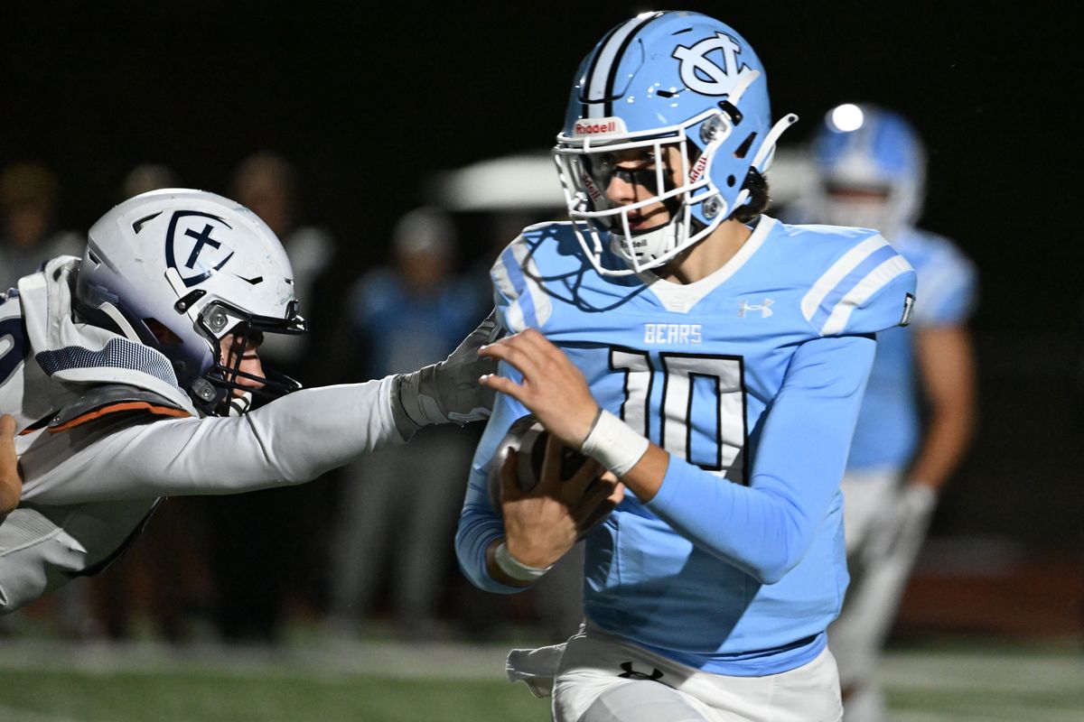 Central Valley quarter back Tuff Ryan (10) runs the ball for a first down during the first half of a high school football game with Gonzaga Prep, Friday, Oct. 18, 2024, at Central Valley.  (COLIN MULVANY/THE SPOKESMAN-REVIEW)