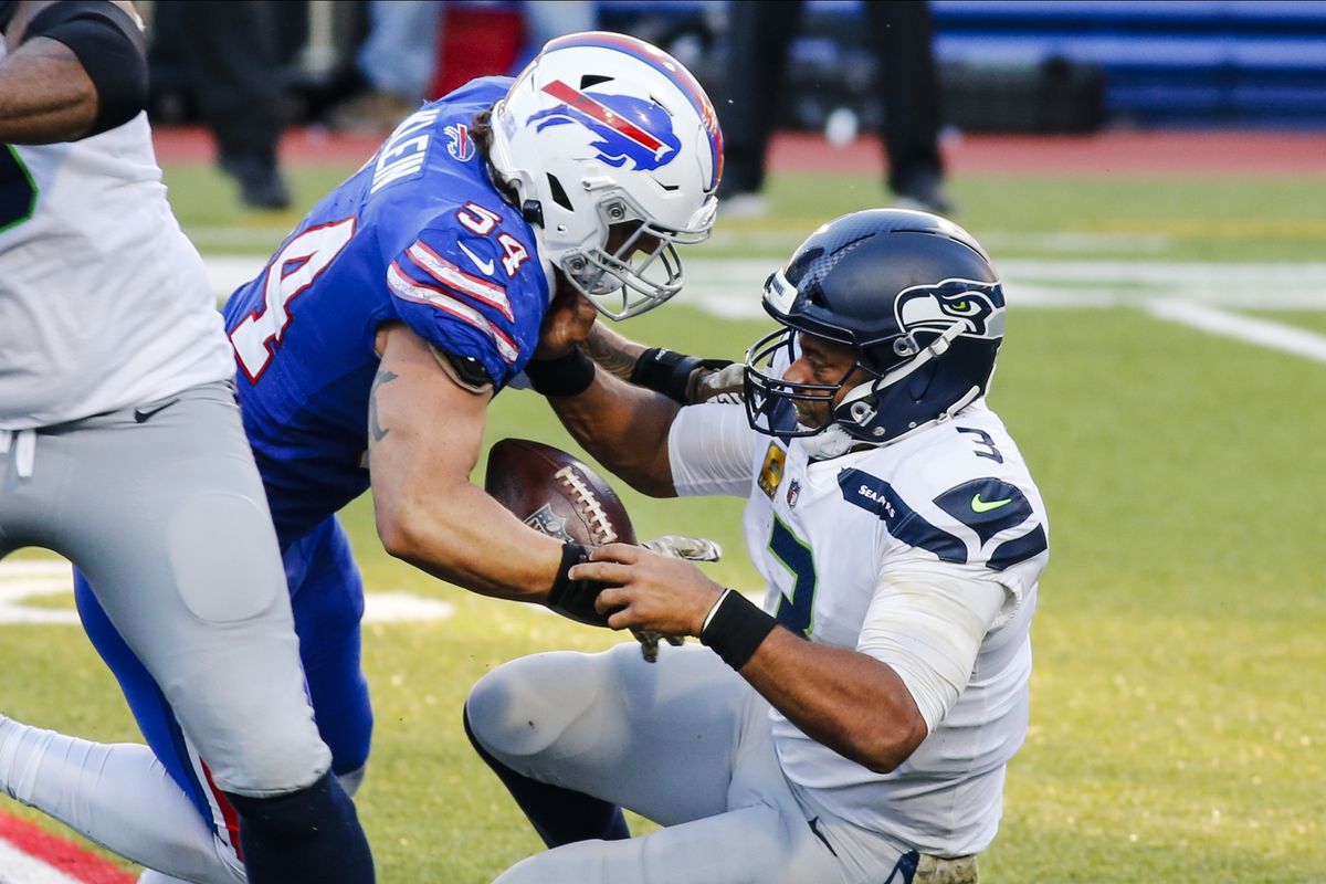 Buffalo Bills’ A.J. Klein (54) strip sacks Seattle Seahawks quarterback Russell Wilson (3) during the second half of an NFL football game Sunday, Nov. 8, 2020, in Orchard Park, N.Y. Klein recovered the ball on the play.  (Jeffrey T. Barnes)