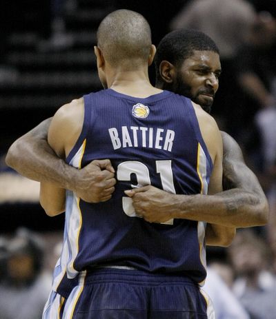 Memphis’ O.J. Mayo, right, and Shane Battier celebrate after the Grizzlies beat the Spurs for the franchise’s first playoff victory. (Associated Press)