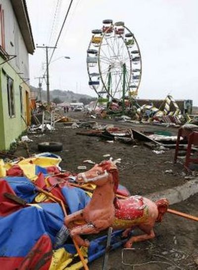 A local circus that was destroyed by the waves generated by a major earthquake is seen in Iloca, March 1, 2010. Chile's government scrambled on Monday to provide aid to thousands of homeless people in coastal towns devastated by a massive earthquake and tsunamis, as 10,000 troops patrolled to quell looting.
REUTERS/Eliseo Fernandez (CHILE - Tags: DISASTER ENVIRONMENT)
Photo Tools
