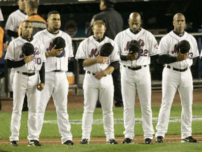 
Mets observe a moment of silence for Cory Lidle Thursday. 
 (Associated Press / The Spokesman-Review)