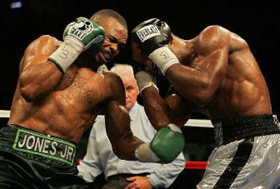 
Roy Jones Jr., left, controlled the fight against Prince Badi Ajamu in Boise, winning for the first time in four fights.
 (Associated Press / The Spokesman-Review)