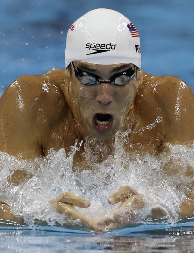 Michael Phelps, pictured in the 200-meter individual medley, came up short in the 200 freestyle against his friend, Ryan Lochte. (Associated Press)