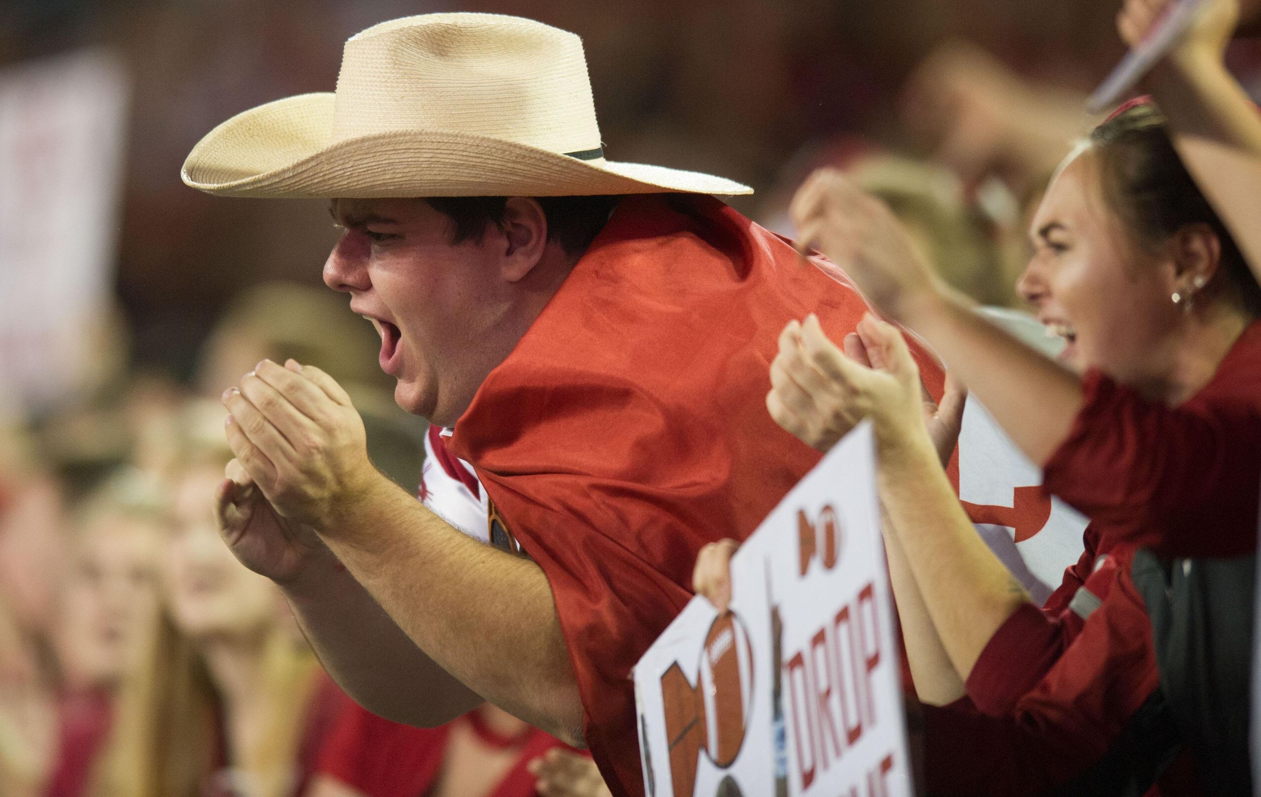 WSU senior Frankie Luvu unleashes his inner Boa