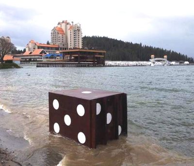 Coeur d'Alene resident Mark Sales snapped this photo of the giant, brown dice with white spots on the Coeur d'Alene shoreline Saturday. (Photo courtesy of the Coeur d'Alene Press)