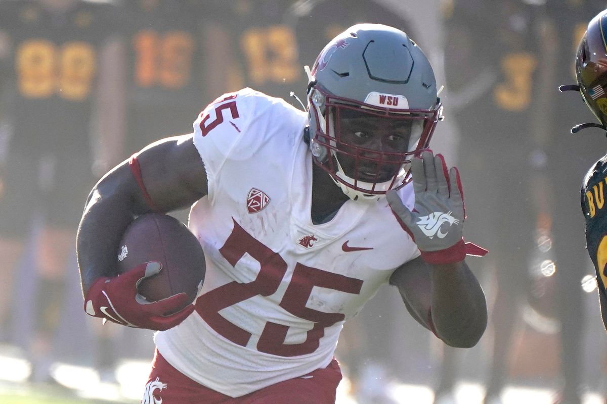 Washington State running back Nakia Watson finds a lane against Arizona State on Oct. 30 in Tempe, Arizona. Watson, the Cougars