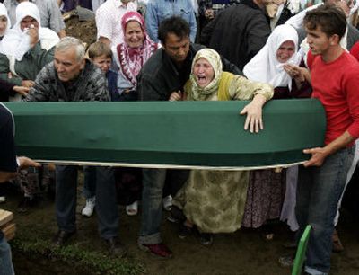 
A woman cries during a funeral for Bosnian Muslims killed by Bosnian Serb forces on July 11, 1995. 
 (Associated Press / The Spokesman-Review)