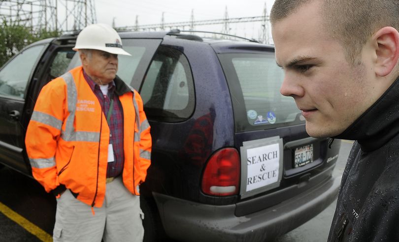 John Polos, left, and Jake Hockett, both with search and rescue experience, are taking a fresh look at the cold case of missing person Julie Weflen. Polos was a co-worker of Weflen’s at BPA. She had gone missing from a substation in 1987. (Dan Pelle)