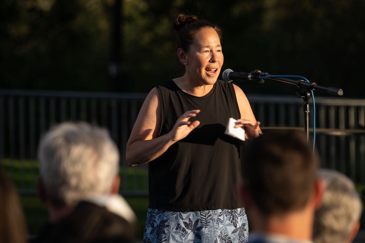 Kim Eng speaks at the Hooptown Hall of Fame ceremony Wednesday on the Hooptown USA Courts in Spokane’s Riverfront Park.  (COLIN MULVANY /THE SPOKESMAN-REVIEW)