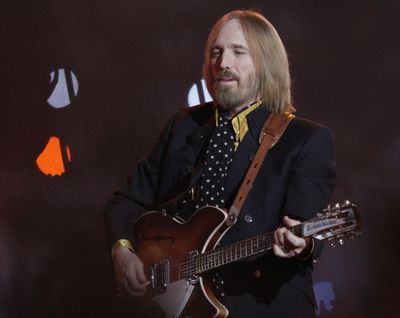 In this Sunday, Feb. 3, 2008 file photo, Tom Petty, of Tom Petty and the Heartbreakers, performs during halftime of the Super Bowl XLII football game between the New York Giants and the New England Patriots in Glendale, Ariz. Tom Petty’s family says his death last year was due to an accidental drug overdose. His wife and daughter released the results of Petty’s autopsy via a statement on his Facebook page Friday night, Jan. 19, 2018. (David J. Phillip / Associated Press)