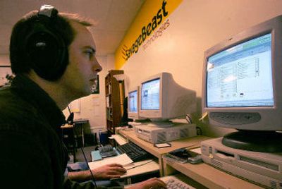 
SavageBeast Technologies senior music analyst Jeff Anthony works at his computer in Oakland, Calif.
 (Associated Press / The Spokesman-Review)