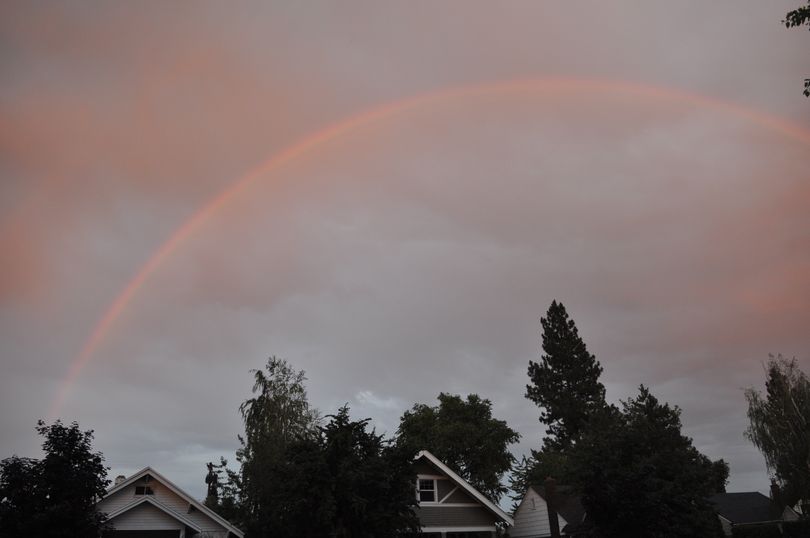 An unusual July rainbow appeared at dusk as rain showers arrived over the Spokane region on Tuesday night. (Mike Prager)
