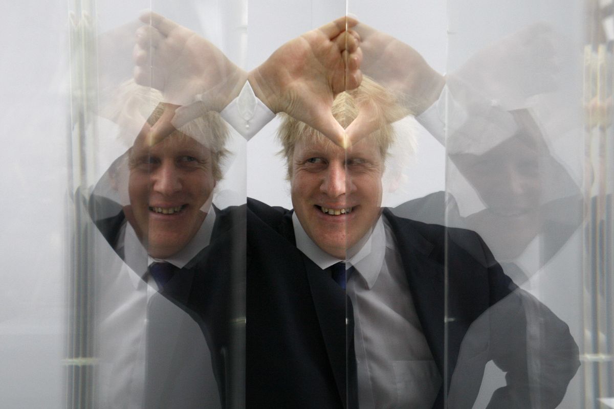 Boris Johnson, then Mayor of London in seen looking through perspex as models of the next two commissions that will appear on the fourth plinth in Trafalgar Square in London, Friday, Jan. 14, 2011. For Boris Johnson, facts have always been flexible. The British prime minister
