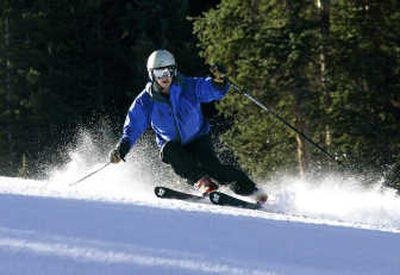 
A skier makes a turn at Arapahoe Basin Ski Area in Colorado, the first North American resort to open for the 2007-08 season.Associated Press
 (File Associated Press / The Spokesman-Review)