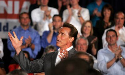 
California Gov. Arnold Schwarzenegger announces his intention to run for re-election during a town hall-style meeting Friday in San Diego. 
 (Associated Press / The Spokesman-Review)