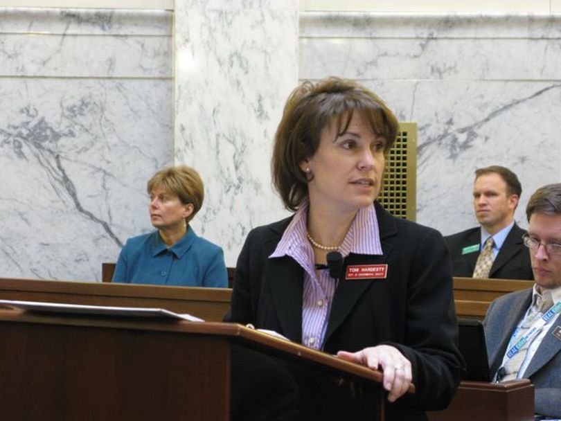 Idaho Department of Environmental Quality Director Toni Hardesty tells lawmakers on Tuesday that the budget request for DEQ for next year will be the lowest state funding level in a decade, though the agency has taken on additional duties. Layoffs, furloughs and cuts in services have resulted, she said. (Betsy Russell)