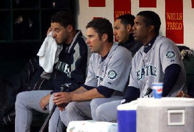 
The Mariners dugout is not the right place for joy and merriment.  
 (Associated Press / The Spokesman-Review)