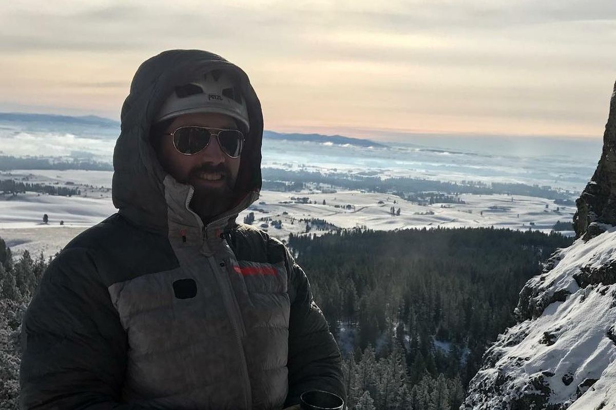 Bryson Williams enjoys a cup of coffee between pitches on the east side of Big Rock, in the Rocks of Sharon-Iller Creek Conservation Area on Dec. 24, 2017. (Nick Sweeney / Courtesy)