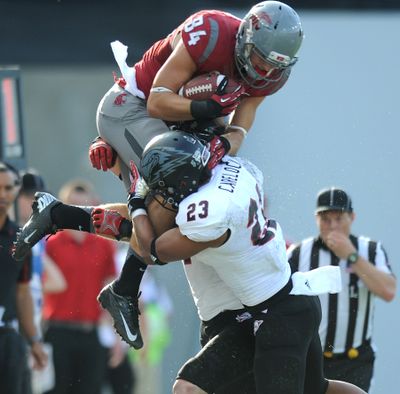 Washington State receiver River Cracraft (84) is forced out of bounds by a Southern Utah player in September's game in Pullman.
 (Tyler Tjomsland / The Spokesman-Review)