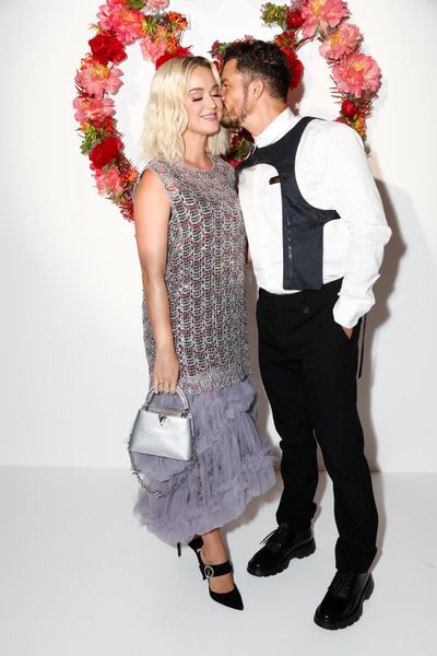 Katy Perry and Orlando Bloom attend the Louis Vuitton Parfum Dinner at Fondation Louis Vuitton on July 5, 2021, in Paris.  (Tribune News Service)