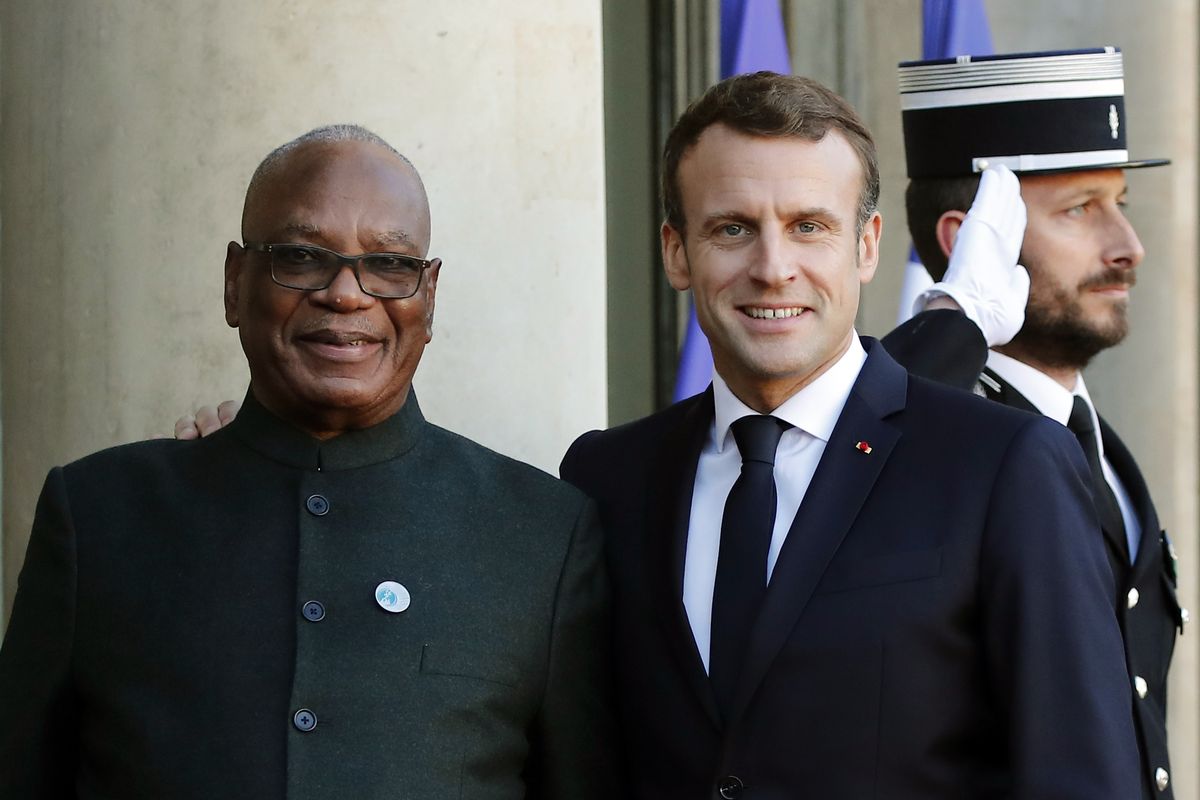 FILE - In this Nov. 12, 2019 file photo, French President Emmanuel Macron welcomes Mali