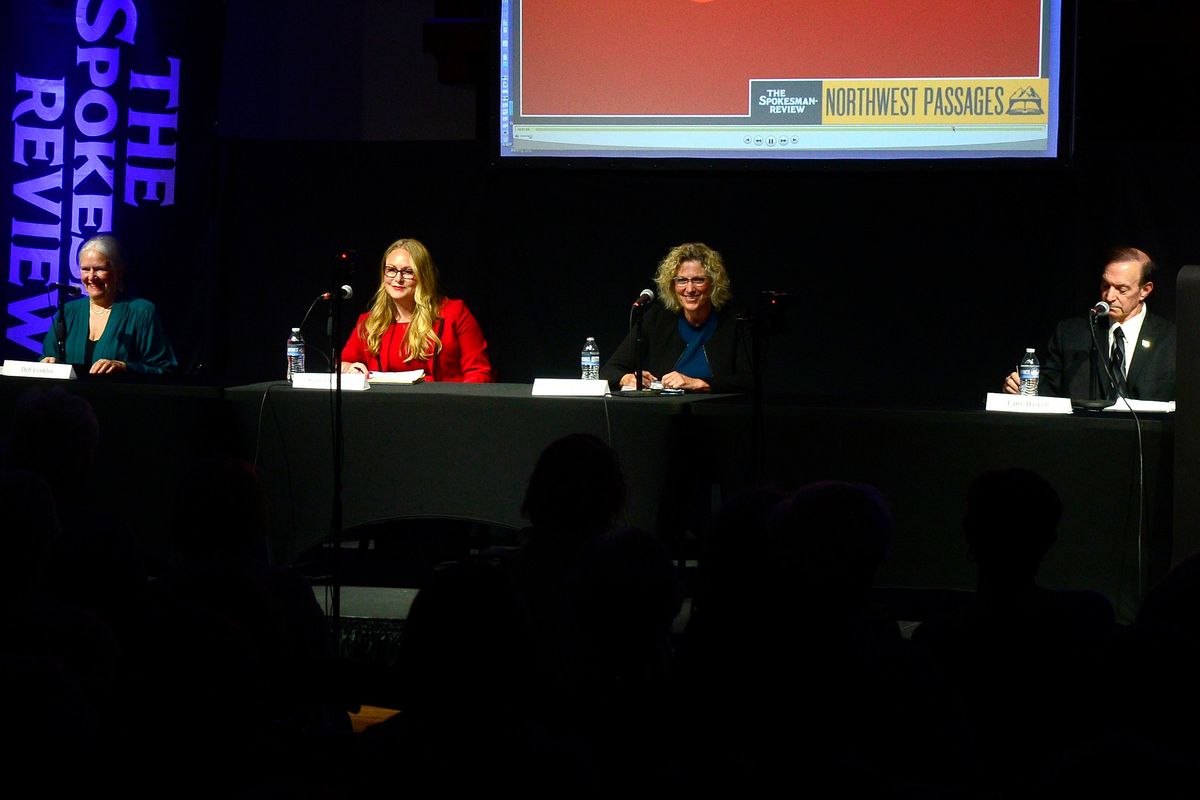 Deb Conklin, Stephanie Olsen, Stefanie Collins and Larry Haskell greet the crowd at The Spokesman-Review