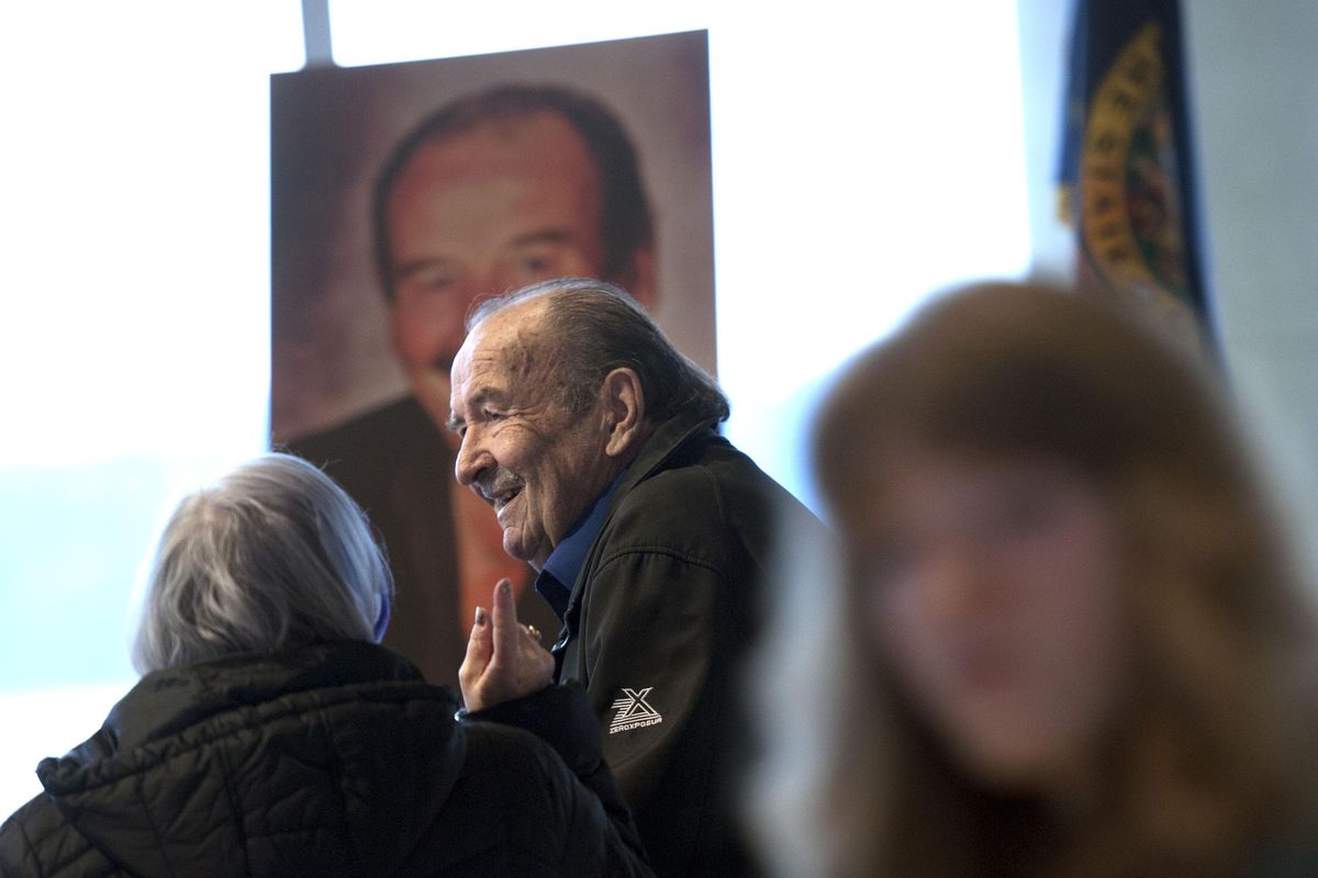Ron Edinger is greeted during his retirement party at the Hagadone Event Center in Coeur d