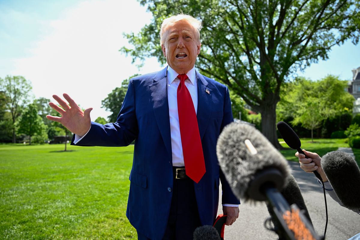 President Donald Trump talks with reporters on the South Lawn of the White House last week. He sat down for a wide-ranging interview with NBC’s Kristen Welker. (John McDonnell/for The Washington Post)