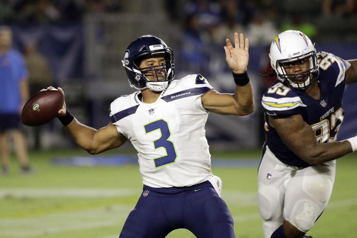 Seattle Seahawks quarterback Alex McGough (5) looks down field after  passing the ball during the fourth quarter of a game against the Los  Angeles Chargers played at the StubHub Center in Carson